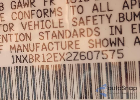 2002 Toyota Corolla Ce z USA, uszkodzony, nr VIN 1NXBR12EX2Z607575